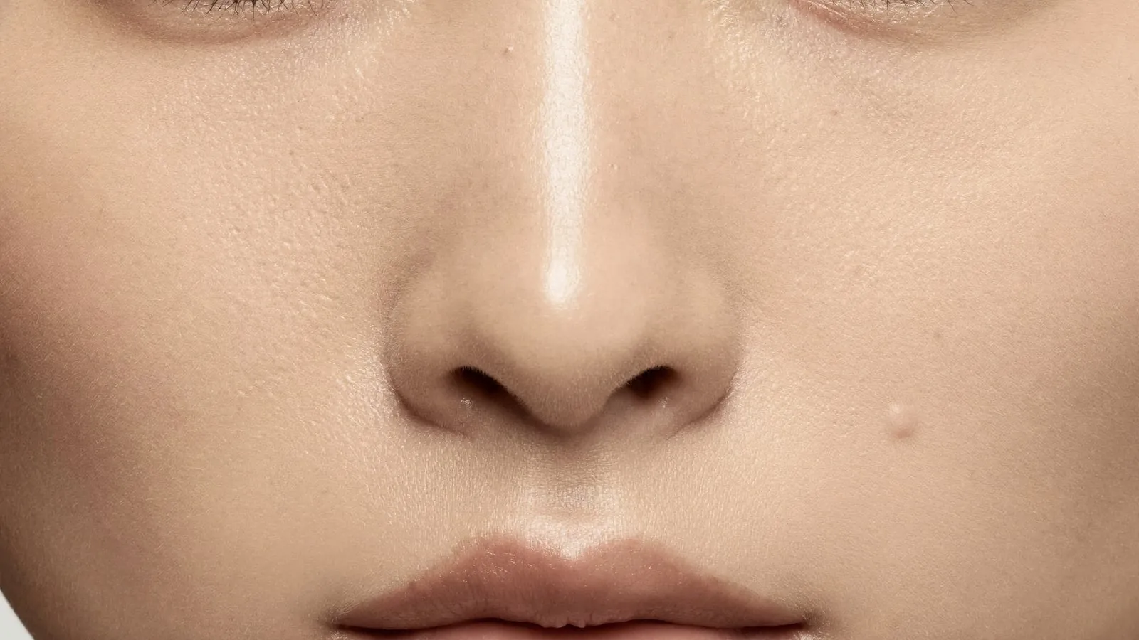 Facial pores and follicle openings examined under magnification
