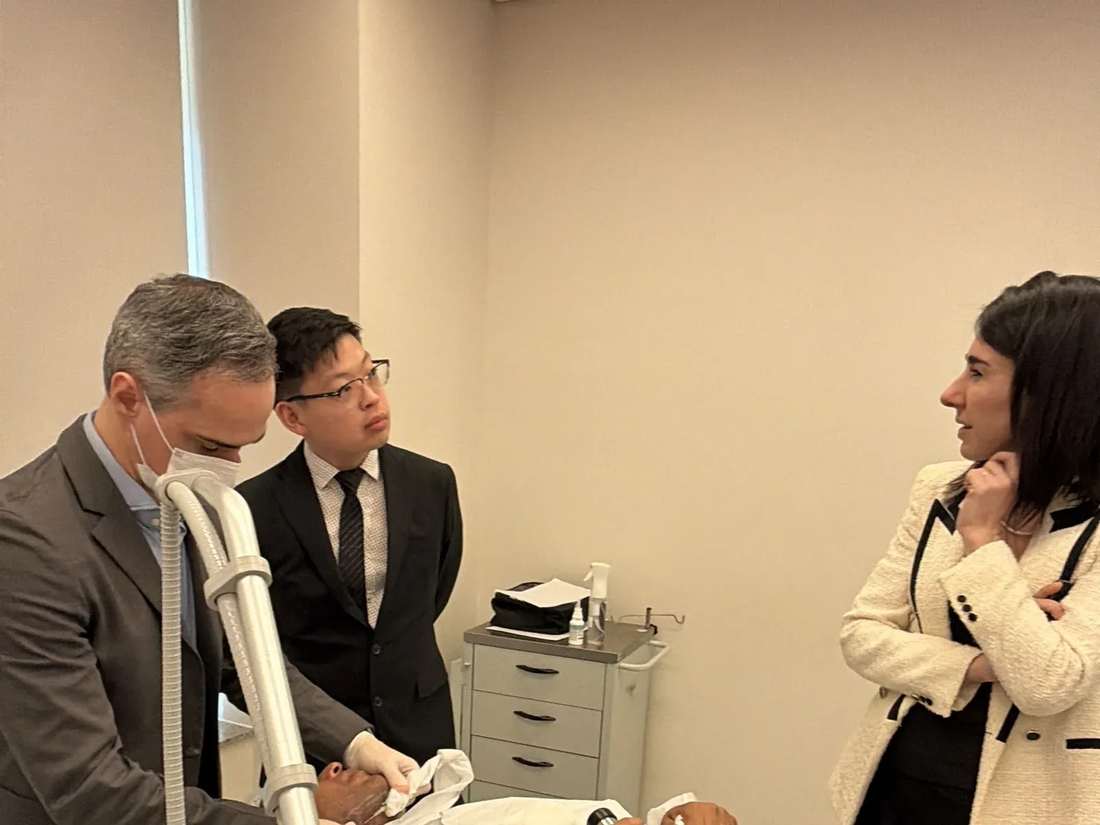 Dr Ana Carbone with Dr Sin Yong and Dr Rogerio Marques at the Secret Duo treatment couch, CLASSYS Academy Sao Paulo