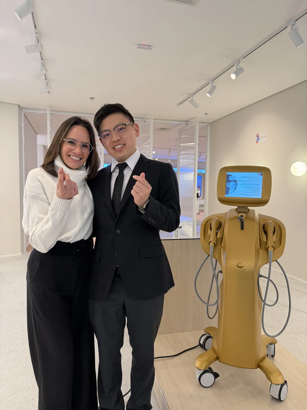 Dr Sin Yong with Stephanie Teixeira, Scientific Director LATAM at CLASSYS, beside an Ultraformer MPT system at CLASSYS Academy, Sao Paulo